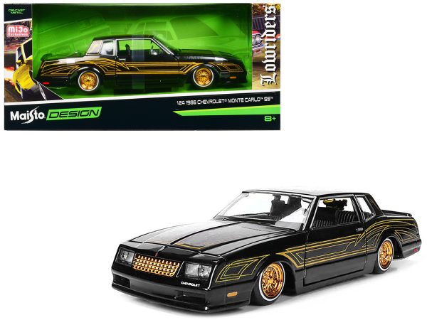 1986 Chevrolet Monte Carlo SS Lowrider Black Metallic with Gold Graphics and Wheels "Lowriders" Series 1/24 Diecast Model Car by Maisto - Image 3