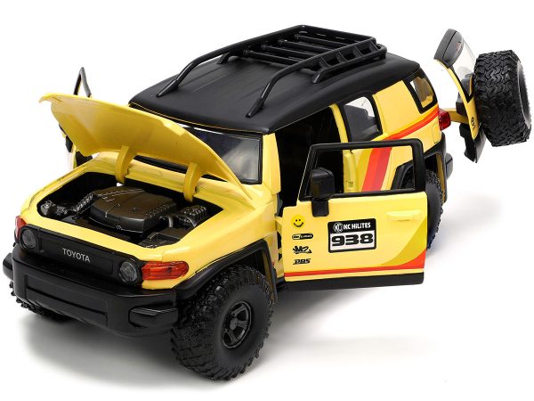 Toyota FJ Cruiser #938 Cream with Matt Black Top with Roof Rack and Stripes "KC Hilites" with Extra Wheels "Just Trucks" Series 1/24 Diecast Model Car by Jada - Image 2