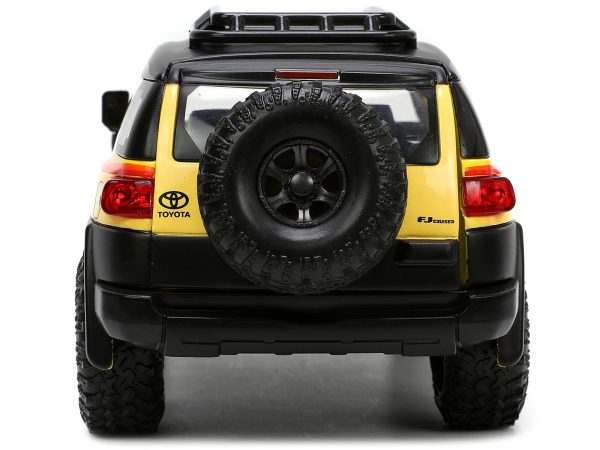 Toyota FJ Cruiser #938 Cream with Matt Black Top with Roof Rack and Stripes "KC Hilites" with Extra Wheels "Just Trucks" Series 1/24 Diecast Model Car by Jada - Image 4