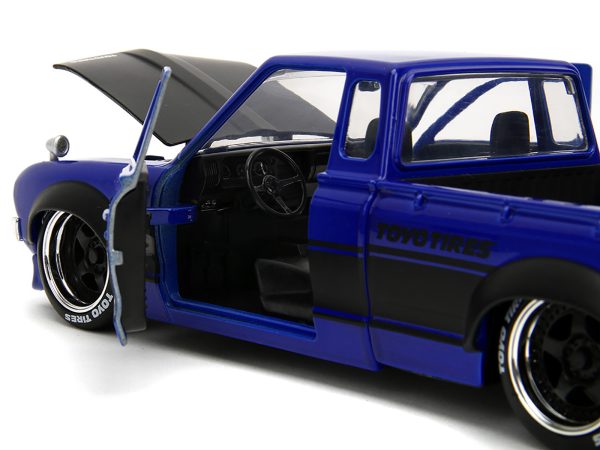 1972 Datsun 620 Pickup Truck #72 Blue Metallic with Black Stripes and Hood "Toyo Tires" with Extra Wheels "Just Trucks" Series 1/24 Diecast Model Car by Jada - Image 3