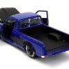 1972 Datsun 620 Pickup Truck #72 Blue Metallic with Black Stripes and Hood "Toyo Tires" with Extra Wheels "Just Trucks" Series 1/24 Diecast Model Car by Jada - Image 4