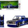 1972 Datsun 620 Pickup Truck #72 Blue Metallic with Black Stripes and Hood "Toyo Tires" with Extra Wheels "Just Trucks" Series 1/24 Diecast Model Car by Jada - Image 5