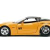 2006 Chevrolet Corvette Yellow with Black Top "Mickey Thompson" "Bigtime Muscle" Series 1/24 Diecast Model Car by Jada