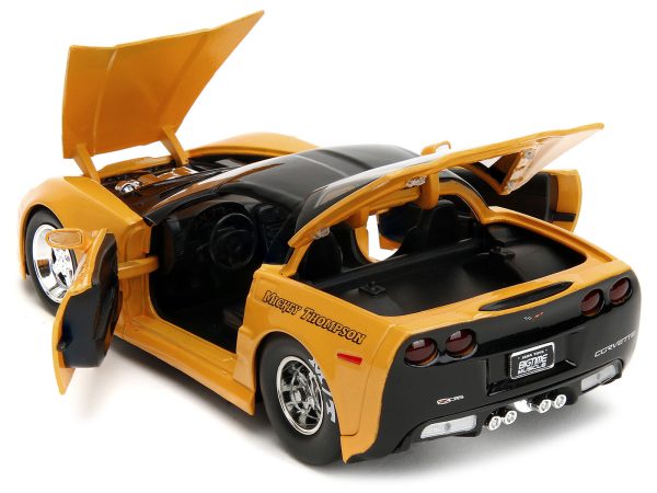 2006 Chevrolet Corvette Yellow with Black Top "Mickey Thompson" "Bigtime Muscle" Series 1/24 Diecast Model Car by Jada - Image 2