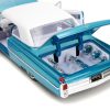 1963 Cadillac Coupe DeVille Blue Metallic and White Gradient with White Top and Interior "Pink Slips" Series 1/24 Diecast Model Car by Jada - Image 4