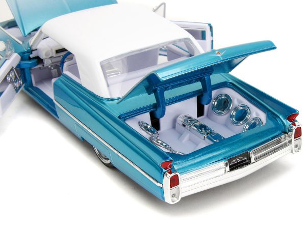 1963 Cadillac Coupe DeVille Blue Metallic and White Gradient with White Top and Interior "Pink Slips" Series 1/24 Diecast Model Car by Jada - Image 4
