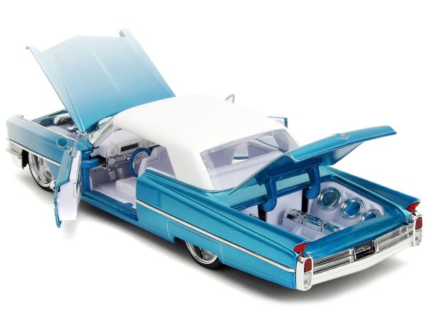 1963 Cadillac Coupe DeVille Blue Metallic and White Gradient with White Top and Interior "Pink Slips" Series 1/24 Diecast Model Car by Jada - Image 3