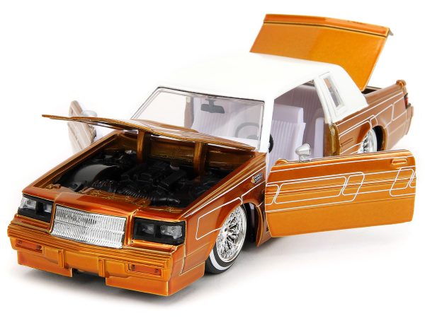 1987 Buick Grand National Orange Metallic with White Top and Interior "Bigtime Muscle" Series 1/24 Diecast Model Car by Jada - Image 3
