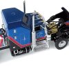 Kenworth W900A Sleeper and Wilson Silverstar Livestock Spread-Axle Trailer Black and Blue with Red Stripes "John Wayne Cattle Co." 1/64 Diecast Model by DCP/First Gear - Image 4