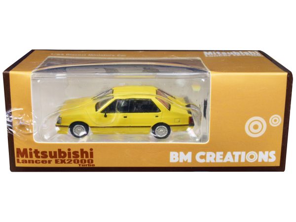 Mitsubishi Lancer EX2000 Turbo Yellow with Stripes with Extra Wheels 1/64 Diecast Model Car by BM Creations - Image 2