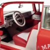1959 Cadillac Eldorado Ambulance Red with White Top "Malibu Beach Rescue" (Weathered) with Surfboards on Roof "Surf Shark" 1/18 Diecast Model Car by Auto World - Image 2