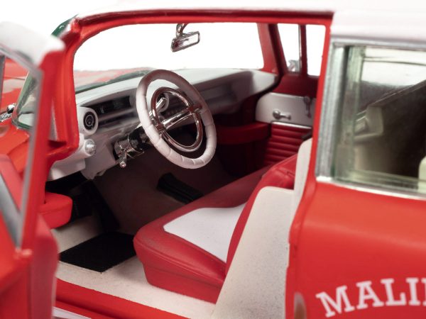 1959 Cadillac Eldorado Ambulance Red with White Top "Malibu Beach Rescue" (Weathered) with Surfboards on Roof "Surf Shark" 1/18 Diecast Model Car by Auto World - Image 2