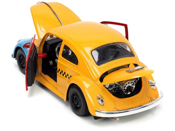 1959 Volkswagen Beetle Taxi Yellow and Blue "Oscar's Taxi Service" and Oscar the Grouch Diecast Figure "Sesame Street" "Hollywood Rides" Series 1/24 Diecast Model Car by Jada - Image 4