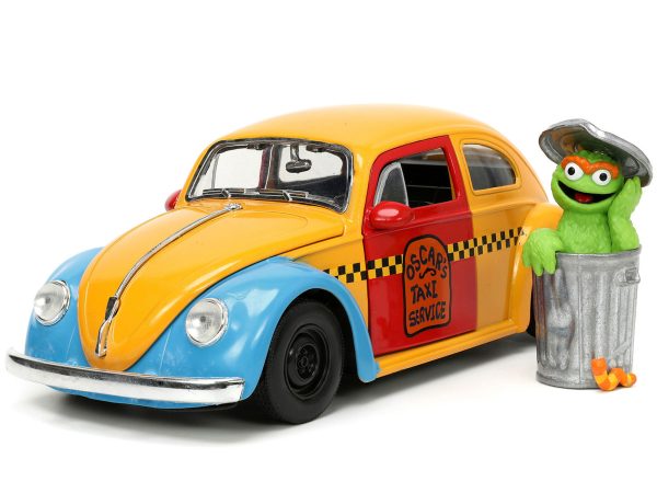 1959 Volkswagen Beetle Taxi Yellow and Blue "Oscar's Taxi Service" and Oscar the Grouch Diecast Figure "Sesame Street" "Hollywood Rides" Series 1/24 Diecast Model Car by Jada - Image 2