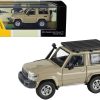 2014 Toyota Land Cruiser 71 SWB (Short Wheel Base) Sandy Taupe Brown 1/64 Diecast Model Car by Paragon Models - Image 4