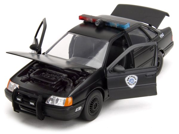 Ford Taurus OCP Matt Black "Detroit Police" and Robocop Diecast Figure 35th Anniversary "Robocop" (1987) Movie "Hollywood Rides" Series 1/24 Diecast Model Car by Jada - Image 3