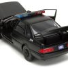 Ford Taurus OCP Matt Black "Detroit Police" and Robocop Diecast Figure 35th Anniversary "Robocop" (1987) Movie "Hollywood Rides" Series 1/24 Diecast Model Car by Jada - Image 4