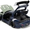 1993 Mazda RX-7 Dark Blue with Green Hood and Kakashi Hatake Diecast Figure "Naruto Shippuden" (2009-2017) TV Series "Anime Hollywood Rides" Series 1/24 Diecast Model Car by Jada - Image 5