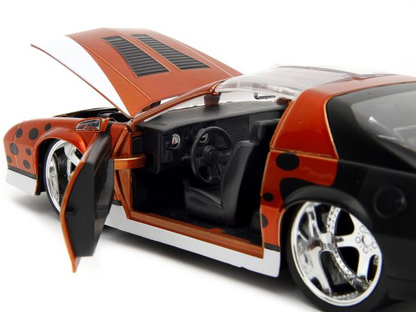 1985 Chevrolet Camaro Z/28 Orange Metallic with Graphics and Chester Cheetah Diecast Figure "Cheetos" "Hollywood Rides" Series 1/24 Diecast Model Car by Jada - Image 3